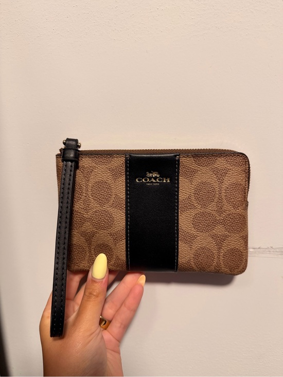 Coach Handbags - Coach Brown Signature Canvas Wristlet with Black Stripe